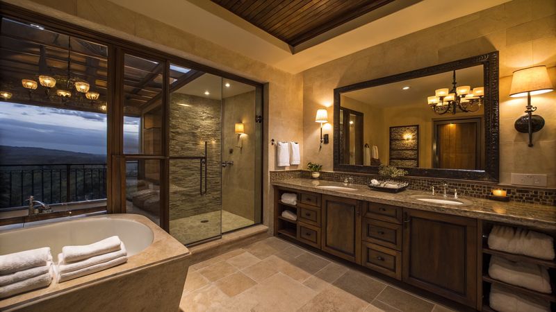 Spotless apartment bathroom with glass shower and double vanity